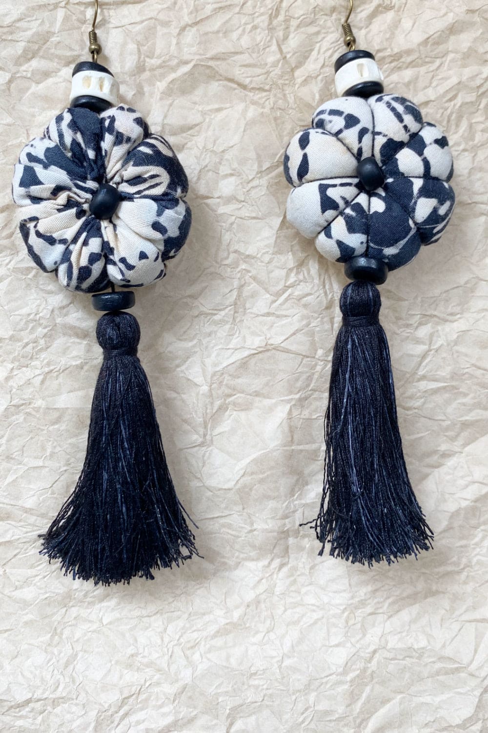 Handcrafted tassel earrings black and creme.