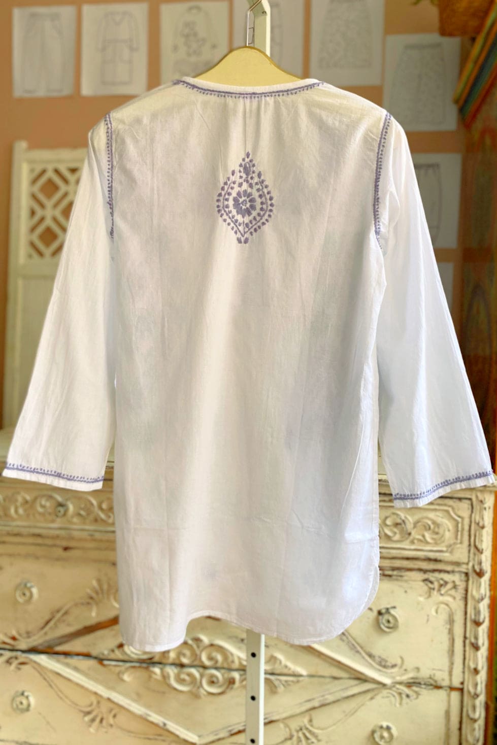 Back view of blue stitched cotton tunic