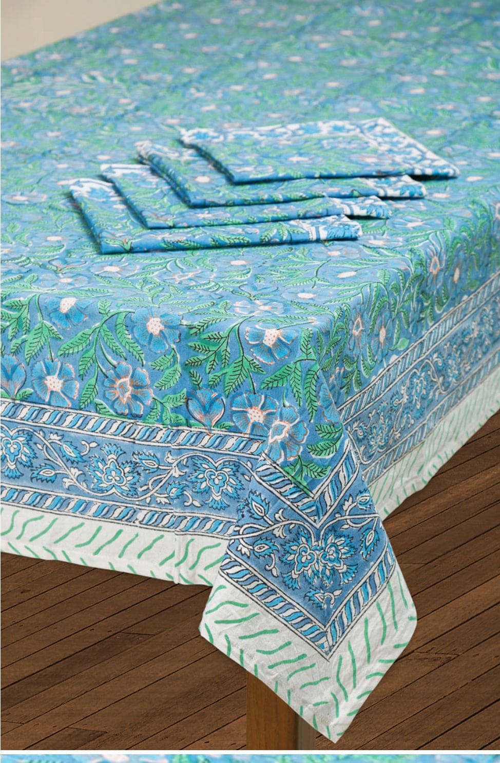 Floral blue cotton tablecloth with matching napkins.