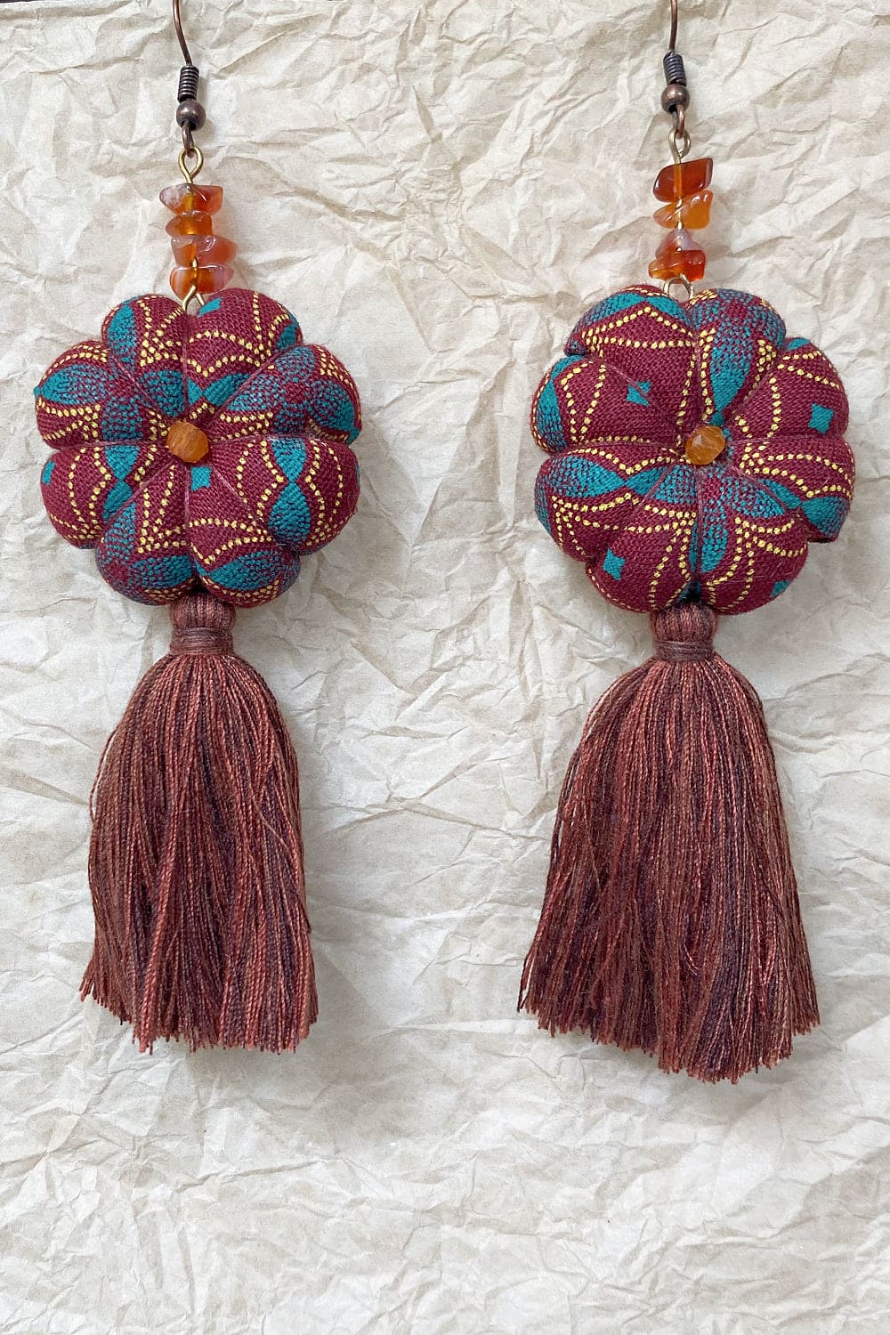 Handcrafted tassel earrings brick and teal.