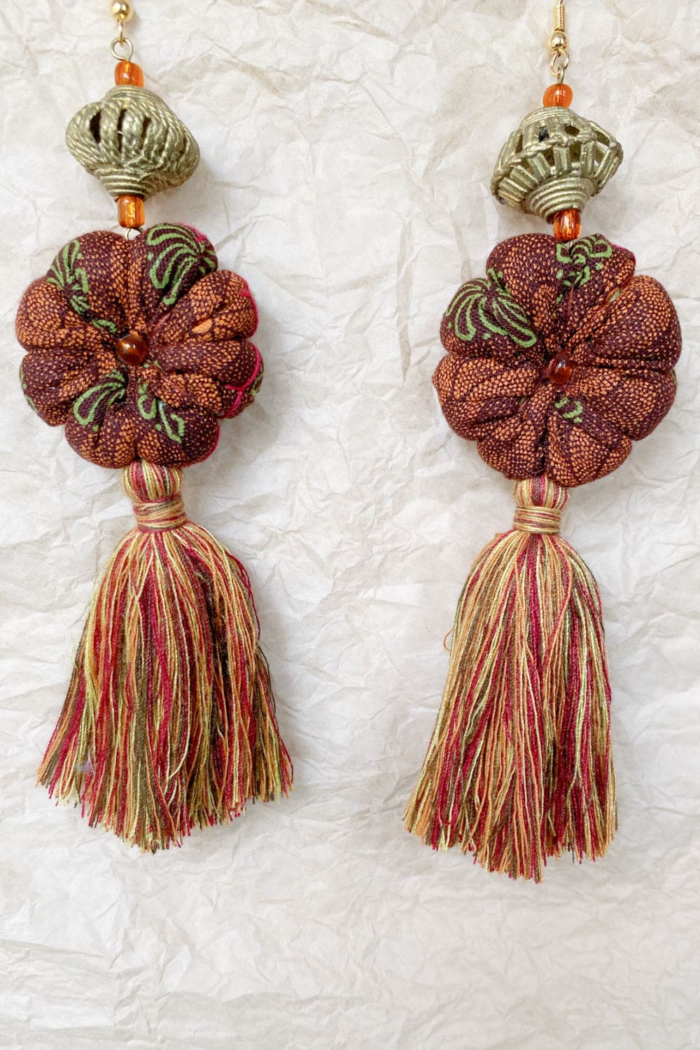 Handcrafted tassel earrings copper and kiwi.