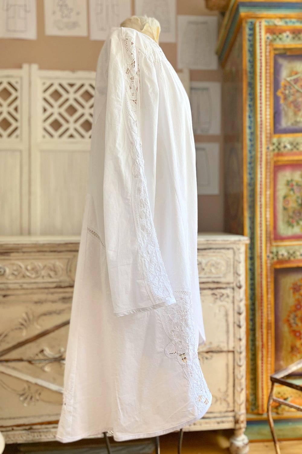 Side view of Vintage tablecloth open front white jacket