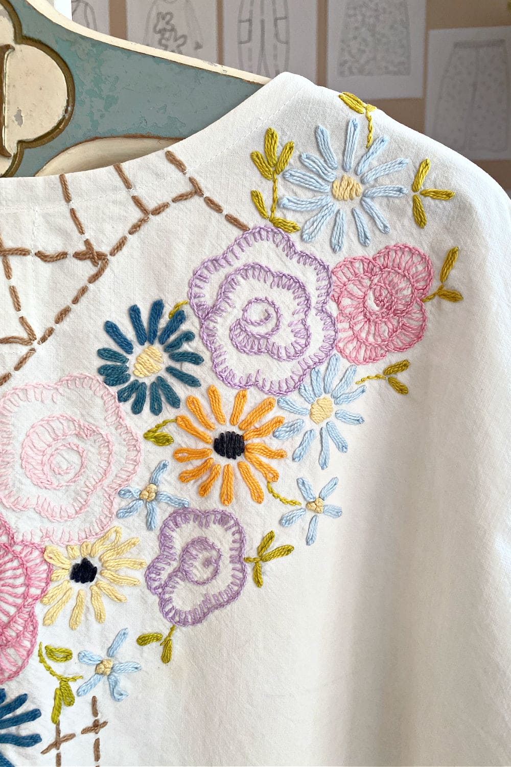 Shoulder closeup of Floral Embroidered vintage table cloth dress