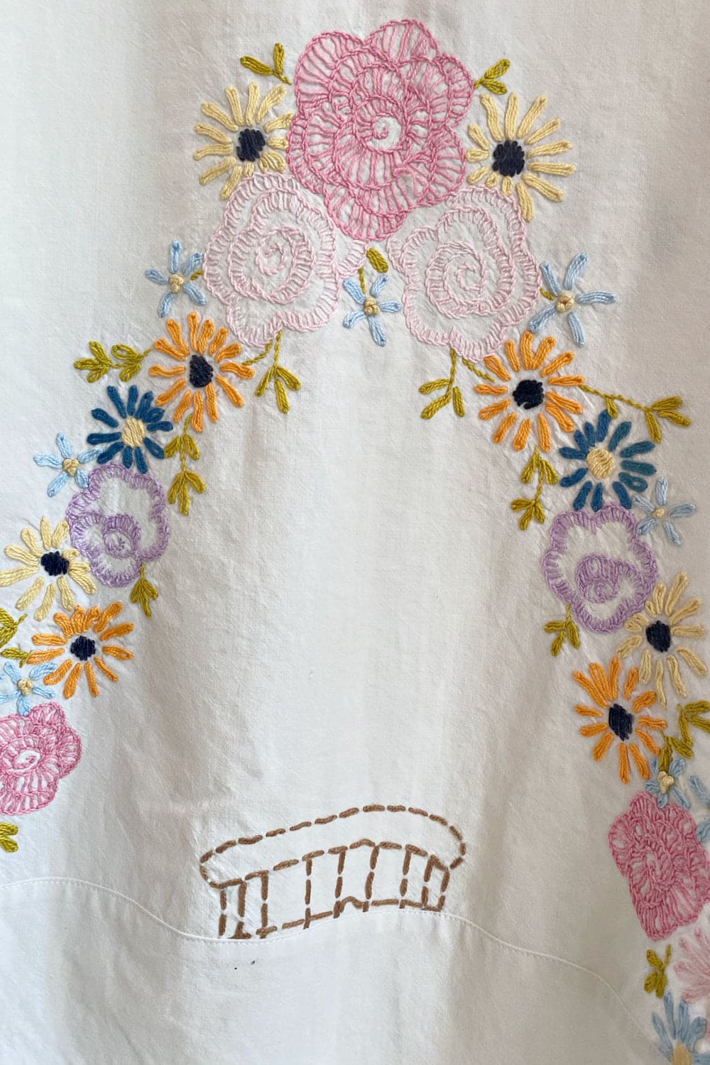 Front closeup of Floral Embroidered vintage table cloth dress