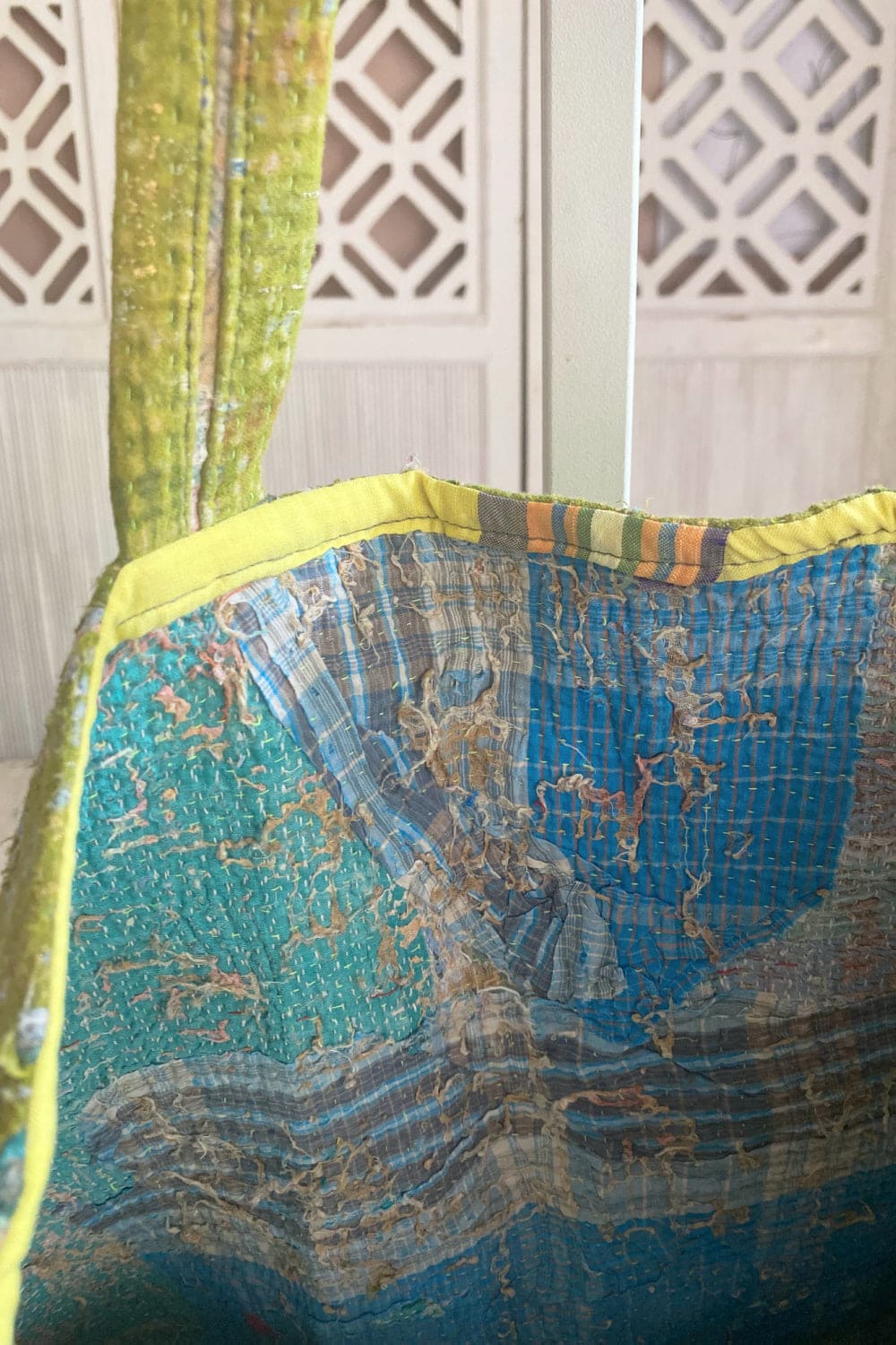 Interior of grass green vintage kantha tote bag.