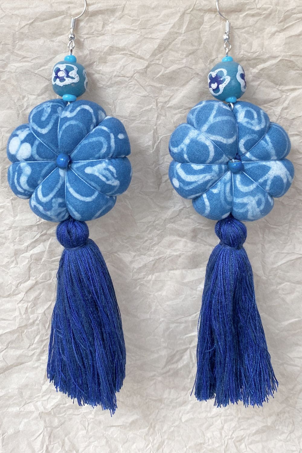 Handcrafted tassel earrings hand dyed blue.