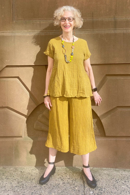 Mineral Yellow striped cotton tee with cotton cropped pants and fun statement necklace.
