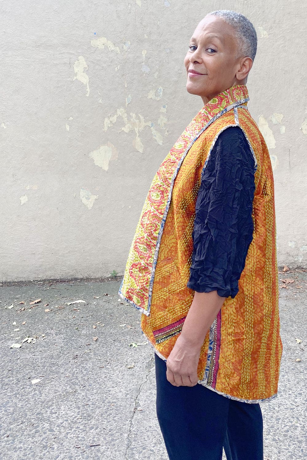 Reversible Kantha stitched silk vest with curved hemline.