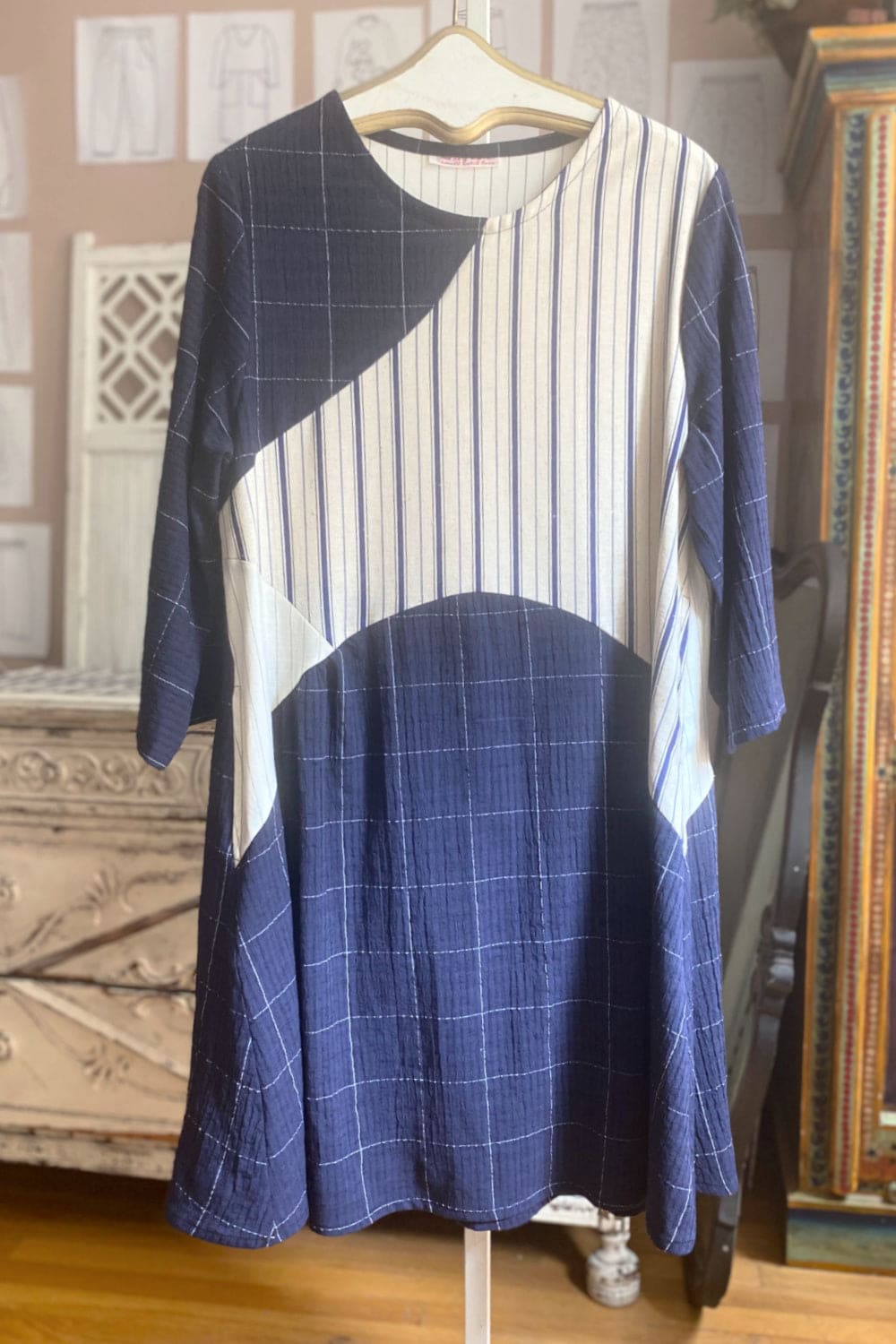 Multi pattern in blues and natural seamed detail tunic with stripes.