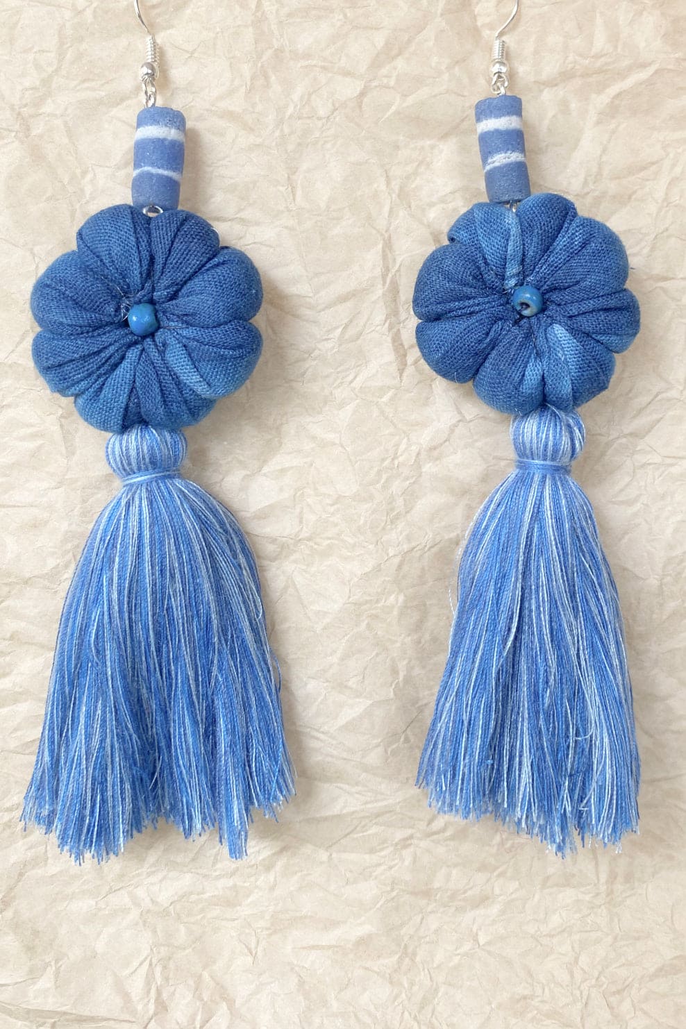 Handcrafted tassel earrings soft blue.