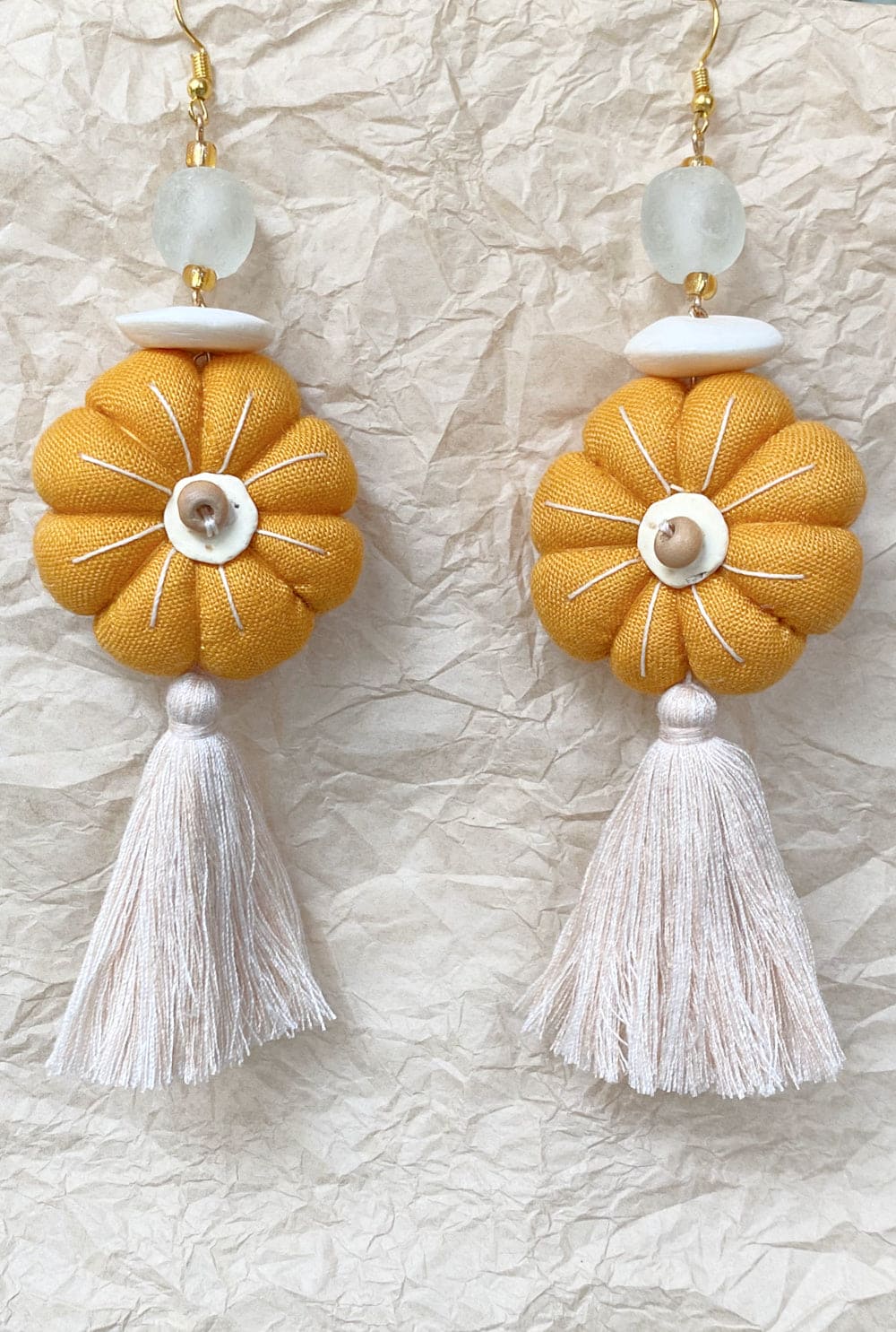 Handcrafted tassel earrings yellow and creme.