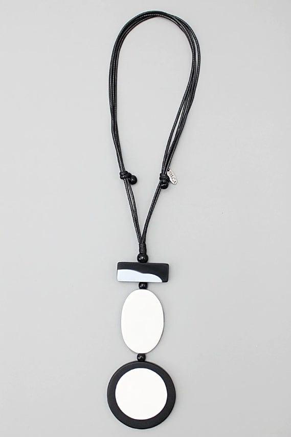 Black and Off White Resin Pendant with an adjustable black wax cord. Very geometric in desiign.