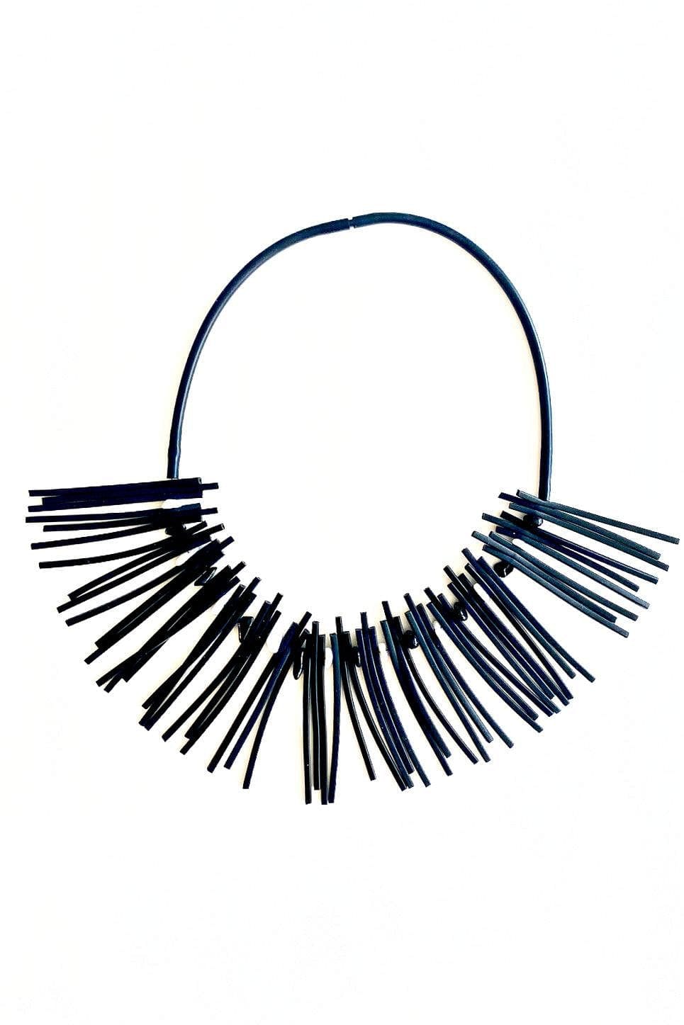 Chips Necklace show on a white background. Black rubber with black beads. 