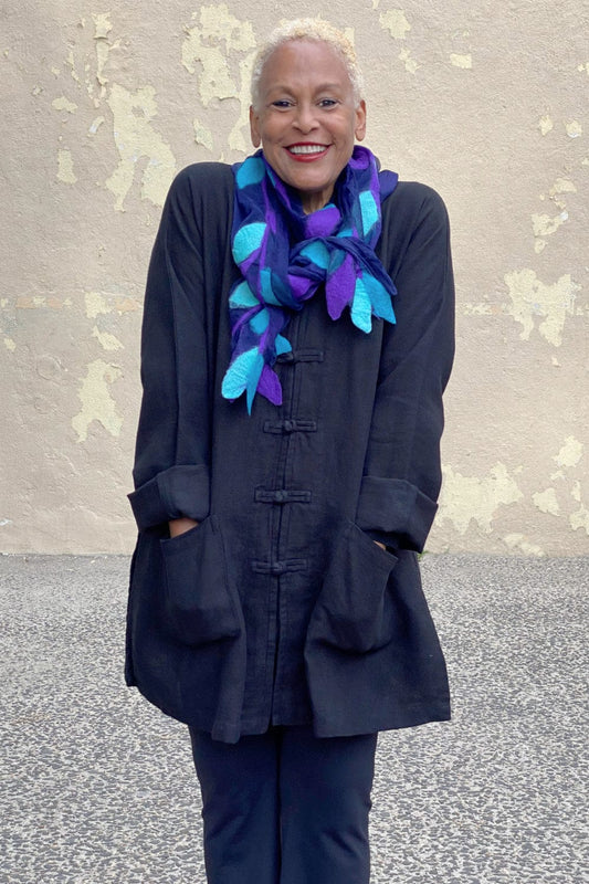 Heavy linen black jacket with merino wool and silk scarf in purple and blues.