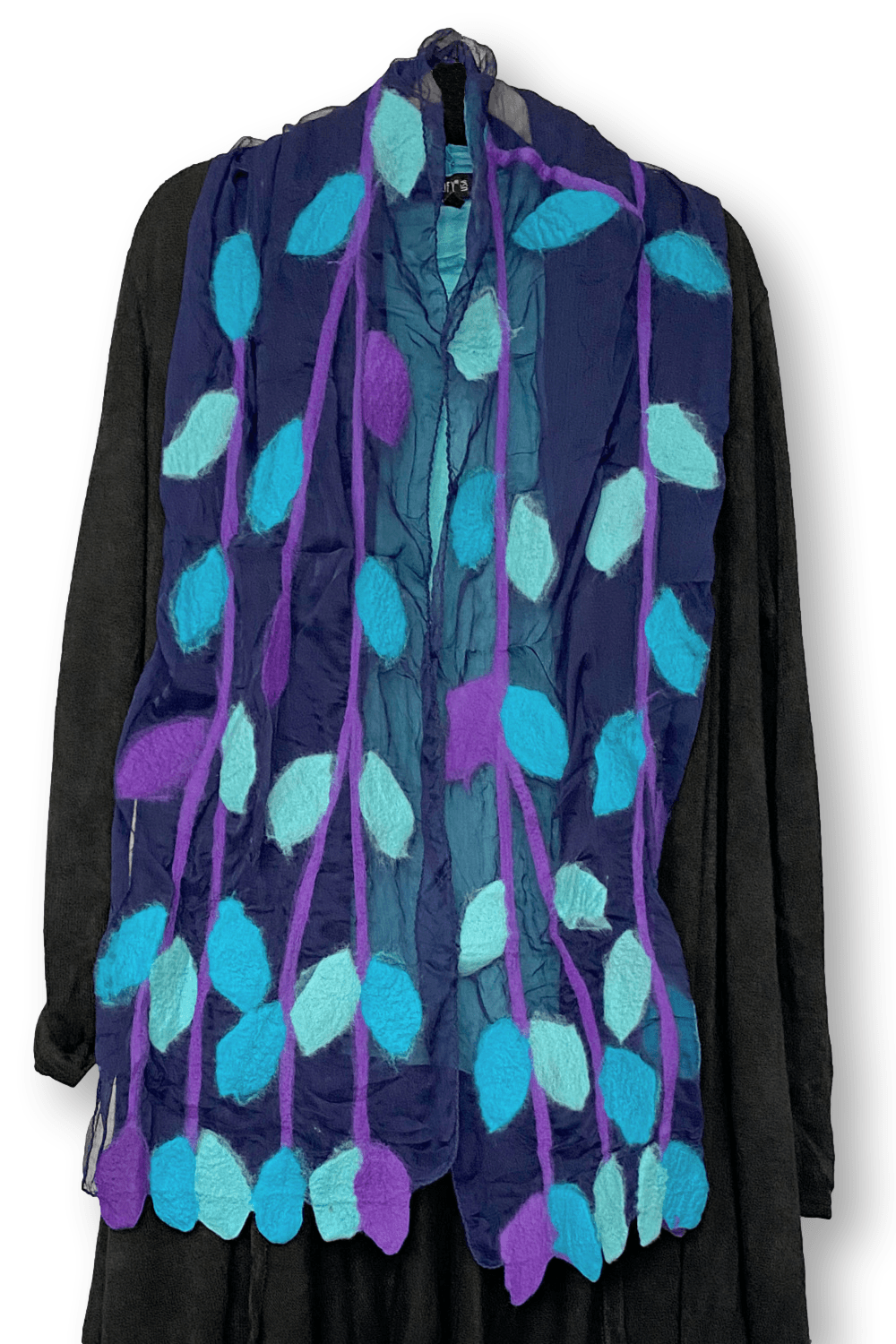 Merino Wool and Silk Chiffon Scarf designed in a leaf motif. Pretty purples and blues styled over a long black sweater.
