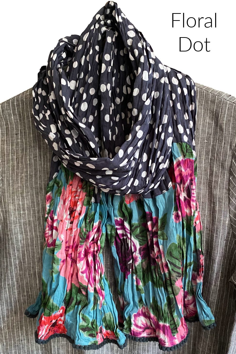 Fun polka dot cotton scarf with floral accent.