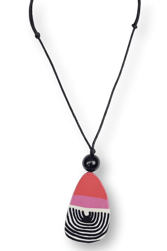 Red Pink Colored pendant with single black wooded bead sitting on top. U shaped black line design on bottom half of the wooden pendant. Red and pink sections op top half of pendant. Strung on an adjustable black cord.