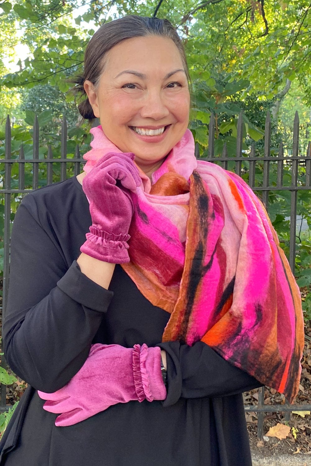 Bright pink silk and wool scarf with pink velvet gloves.