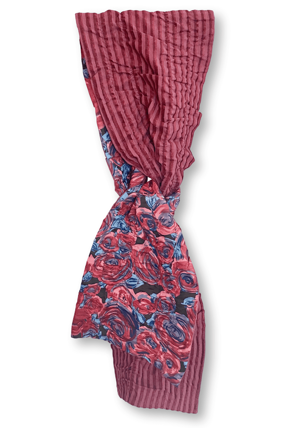 Velvet reversible scarf with  stripes and a floral design in red tones.