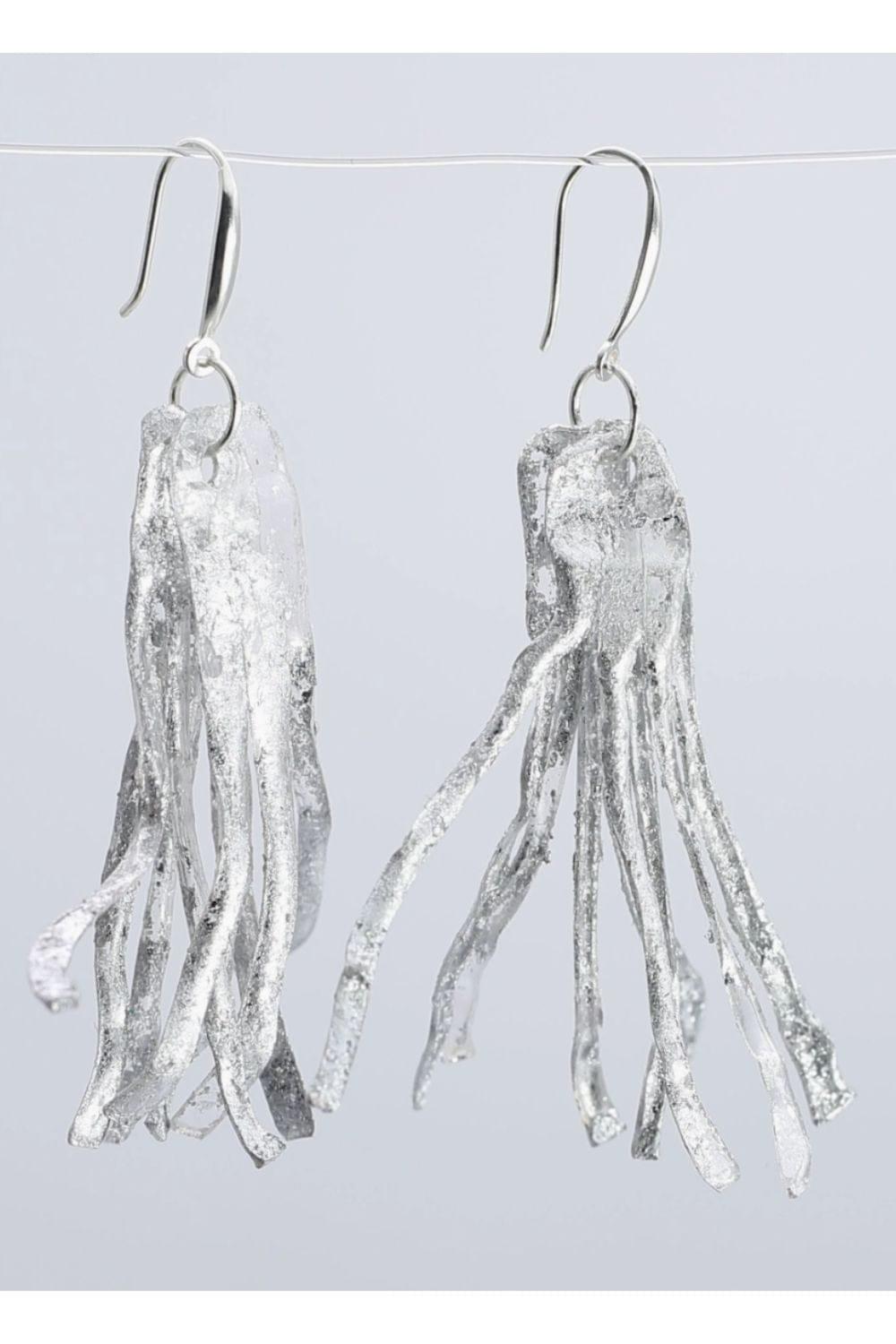 Silver Gilded earrings with sterling silver hooks. They look very light and airy.