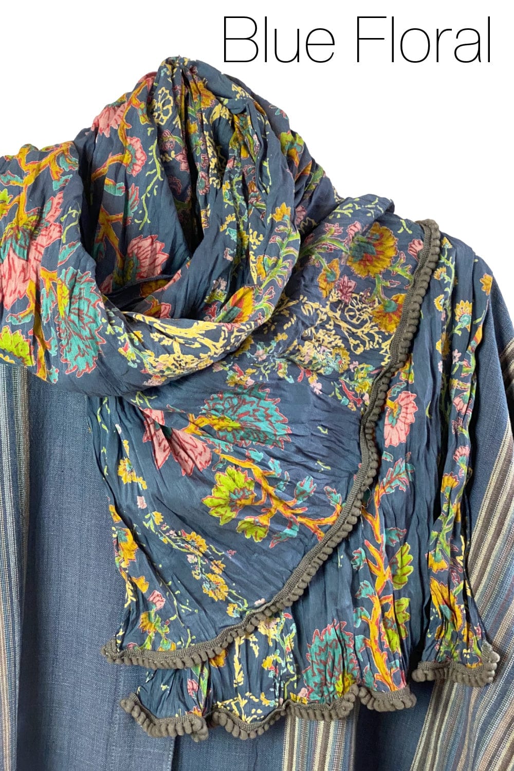 Pretty cotton scarf with floral print. Edges are trimmed little textured trim.